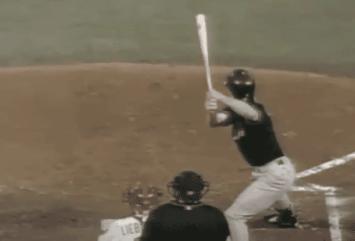 Image of Craig Counsell demonstrating his unconventional batting stance.